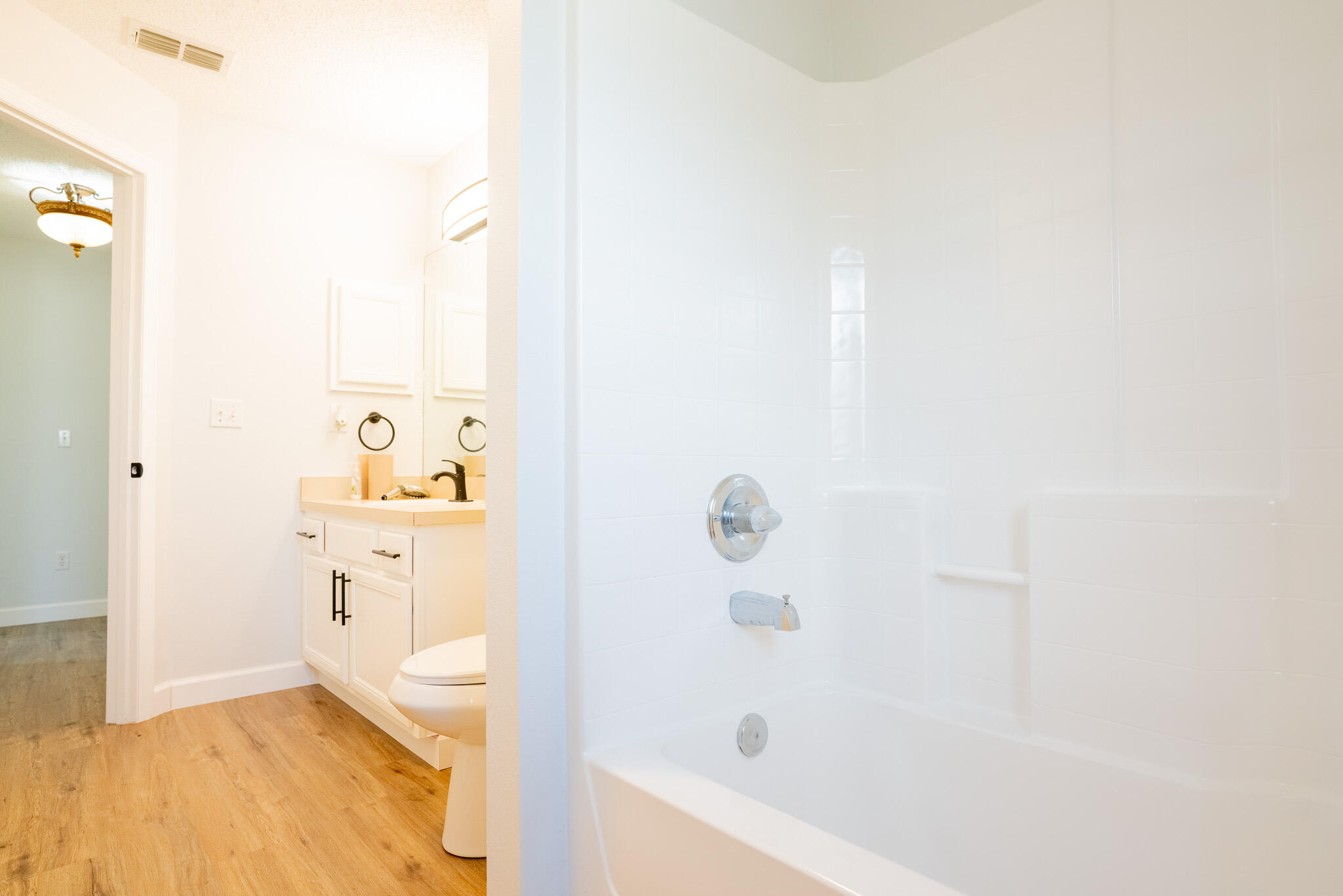 2001 Southwest Ember Street Port St. Lucie, FL 34953 - Photo 20 of 22 a bathroom with a bathtub and a shower
