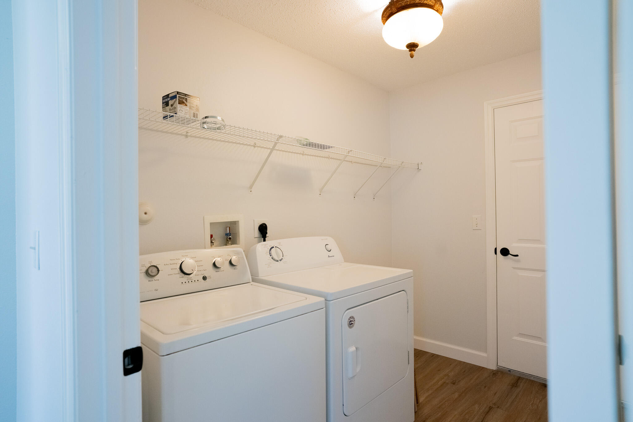 2001 Southwest Ember Street Port St. Lucie, FL 34953 - Photo 21 of 22 a utility room with dryer and washer