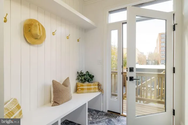 a bed room with a bed and a window