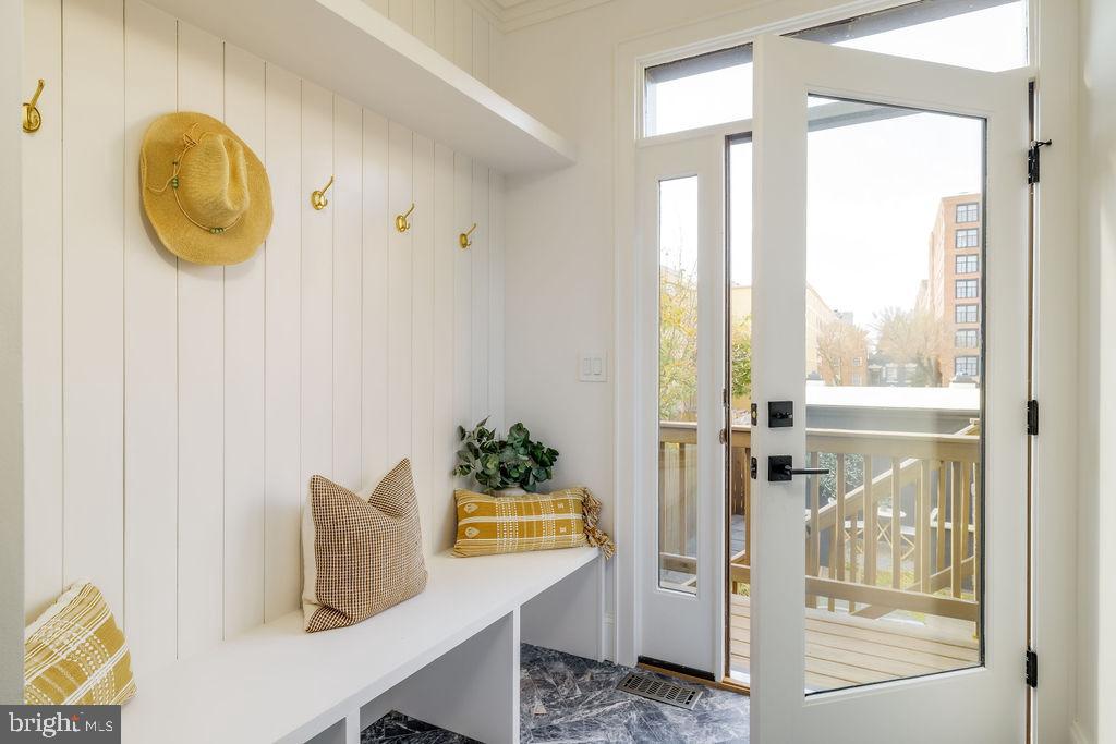 2460 Ontario Road Northwest Washington, DC 20009 - Photo 30 of 85 a view of dining room and wooden floor