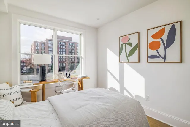 a view of street with sitting area