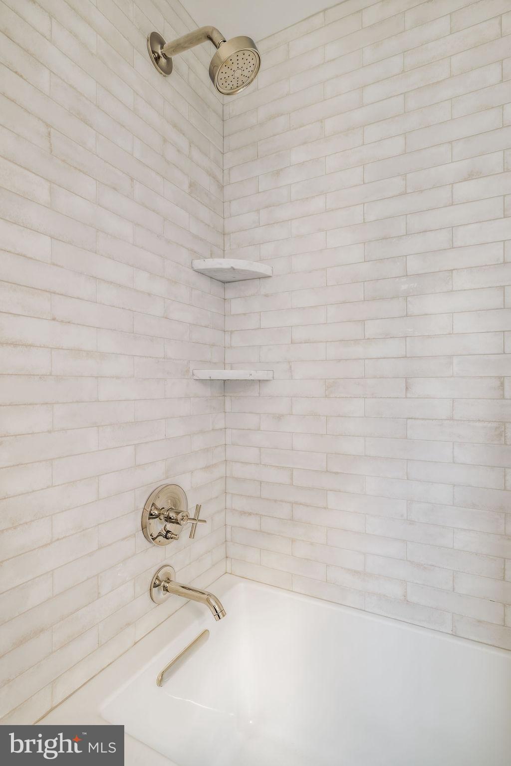 2460 Ontario Road Northwest Washington, DC 20009 - Photo 54 of 85 a bathroom with a shower