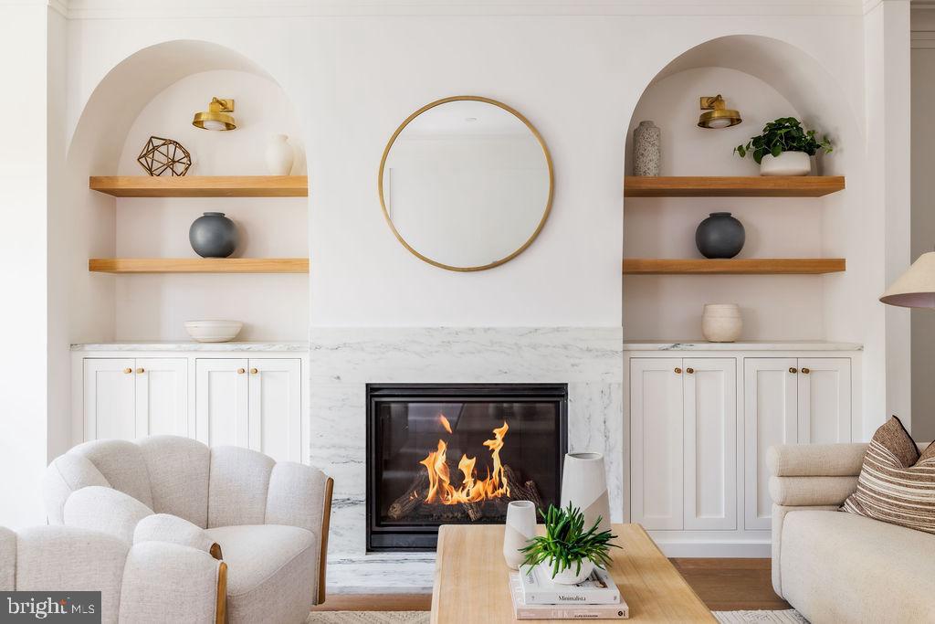 2460 Ontario Road Northwest Washington, DC 20009 - Photo 6 of 85 a living room with furniture and a fireplace