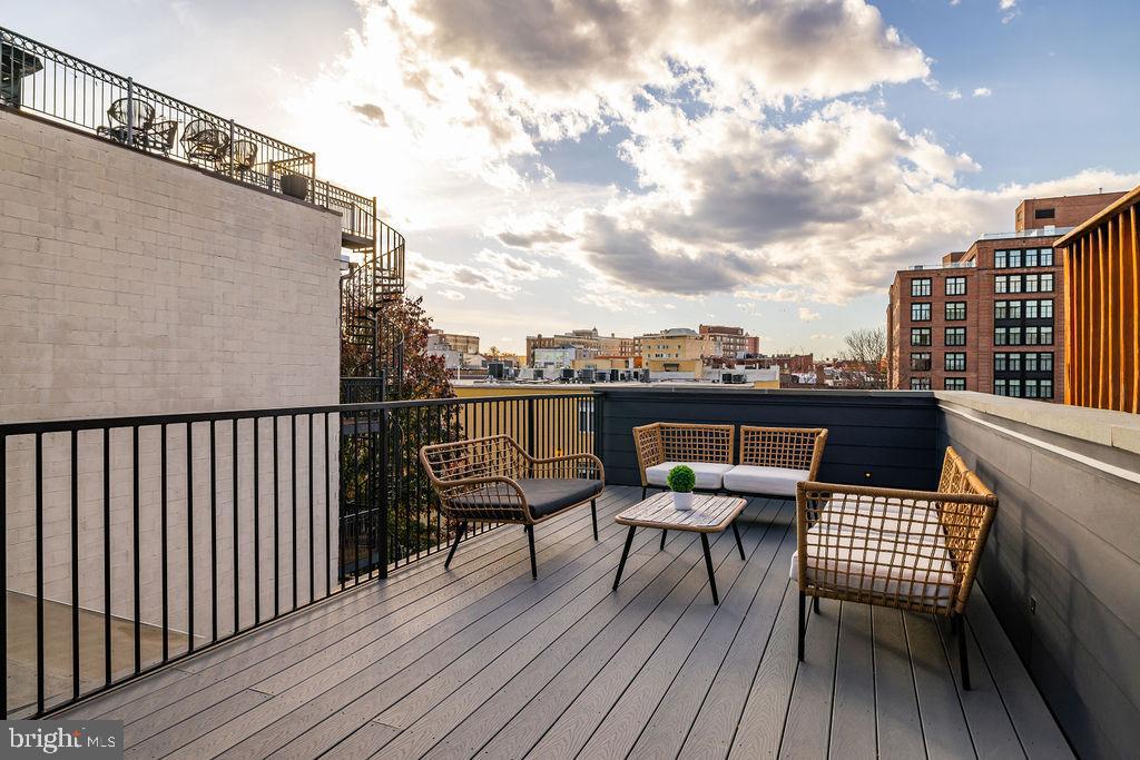 2460 Ontario Road Northwest Washington, DC 20009 - Photo 62 of 85 a balcony view with a seating space