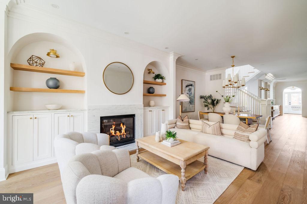 2460 Ontario Road Northwest Washington, DC 20009 - Photo 7 of 85 a living room with furniture and a fireplace