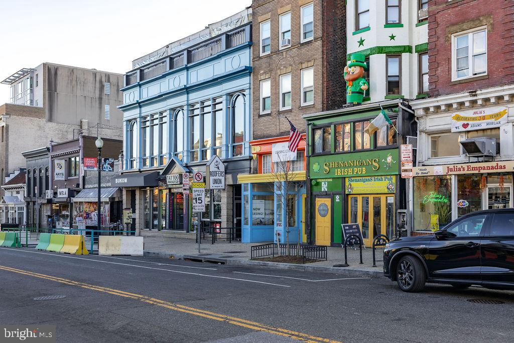 2460 Ontario Road Northwest Washington, DC 20009 - Photo 80 of 85 a car parked in front of a building