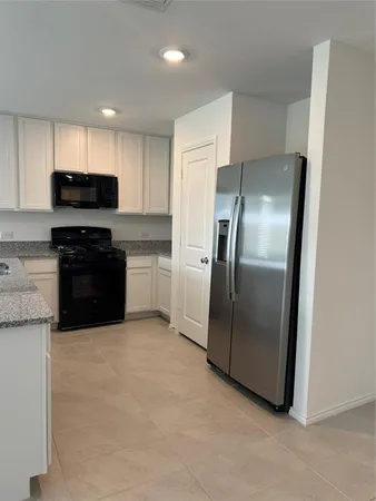 a room with storage and utility