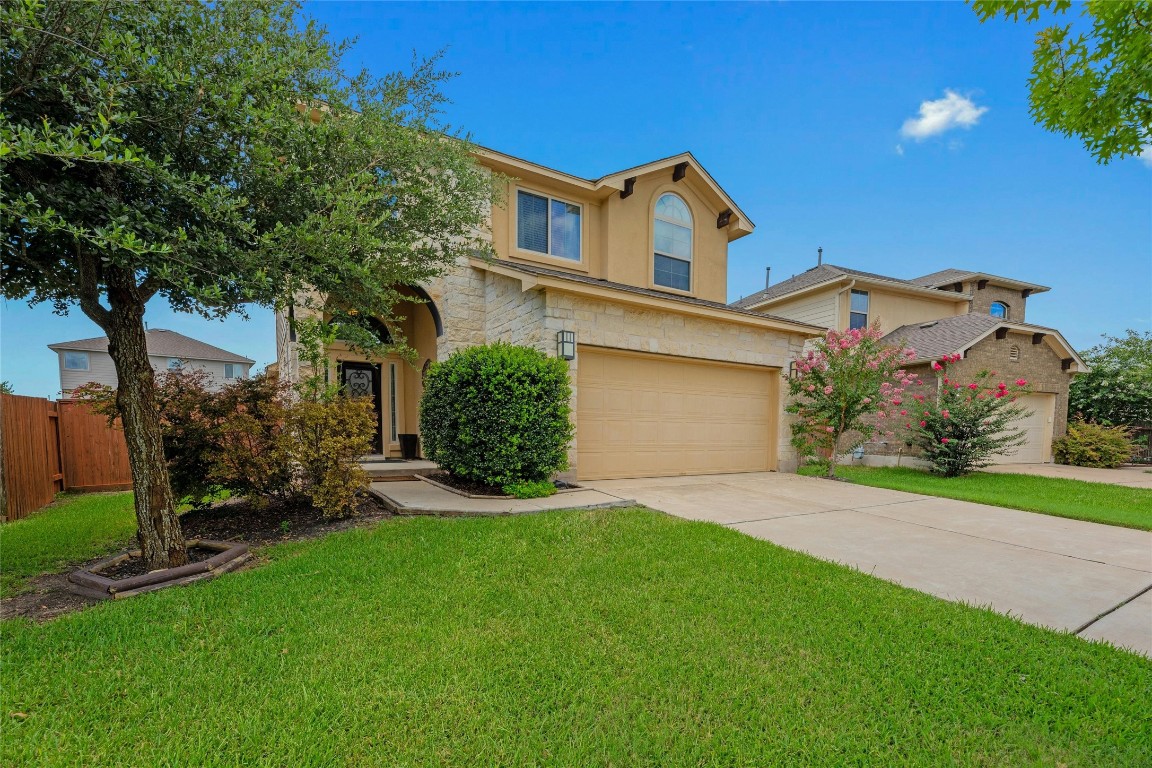 1208 April Meadows Loop Georgetown, TX 78626 - Photo 1 of 1 front view of a house with a yard