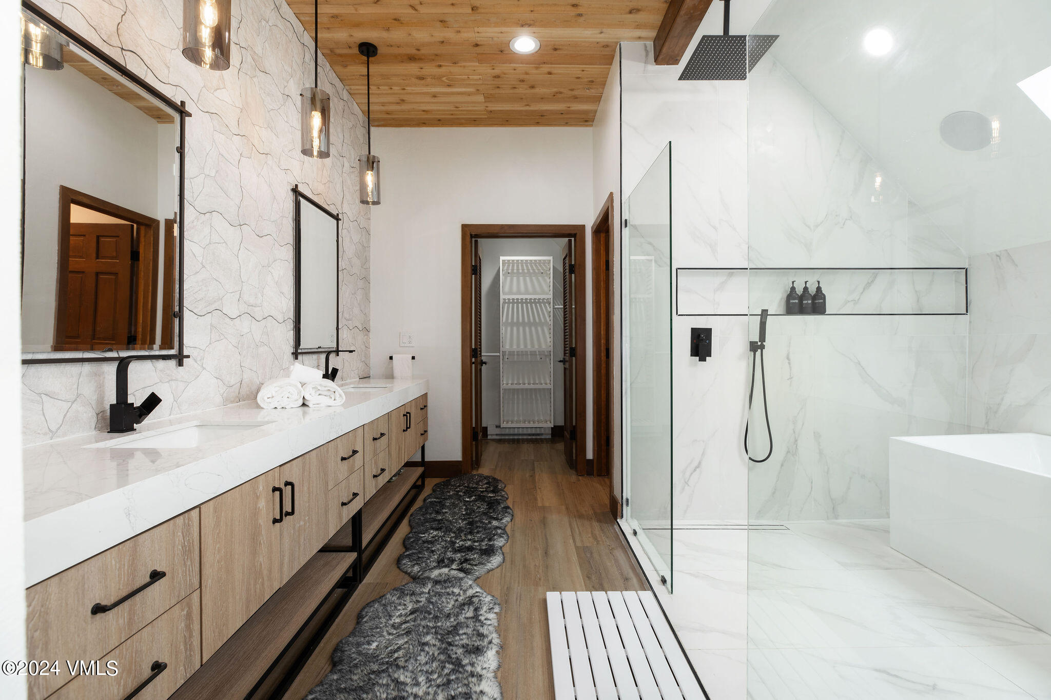 377 Holden Road Beaver Creek, CO 81620 - Photo 13 of 33 a bathroom with a double vanity sink and mirror