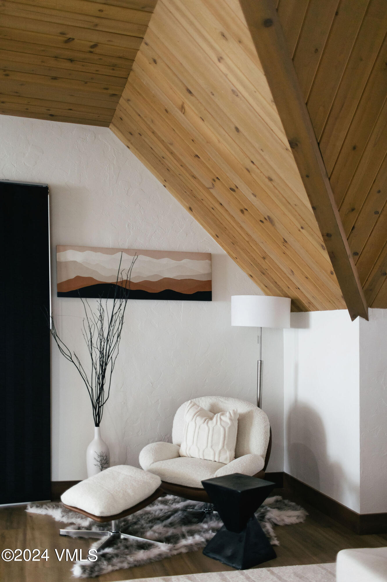 377 Holden Road Beaver Creek, CO 81620 - Photo 16 of 33 a room with furniture and wooden floor