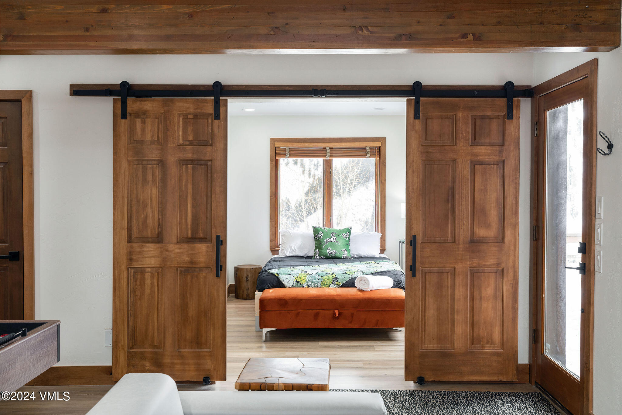 377 Holden Road Beaver Creek, CO 81620 - Photo 25 of 33 a bedroom with a bed and a window