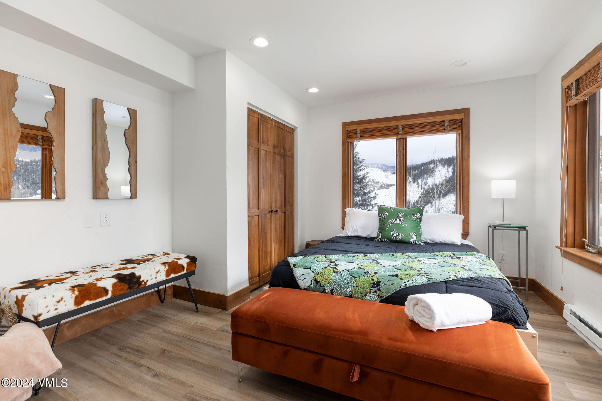 377 Holden Road Beaver Creek, CO 81620 - Photo 26 of 33 a bedroom with furniture and a wooden floor