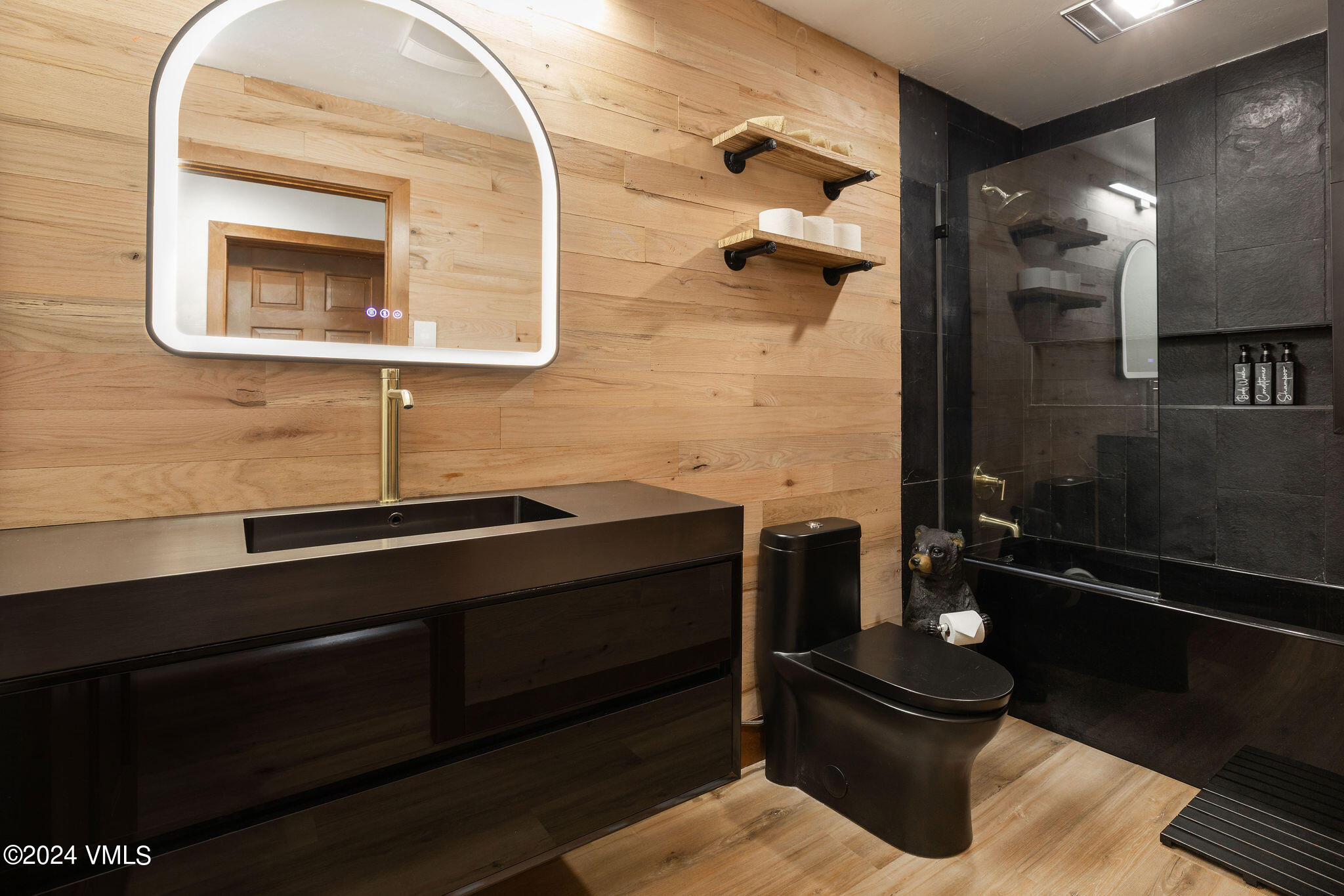 377 Holden Road Beaver Creek, CO 81620 - Photo 27 of 33 a bathroom with a sink and a mirror