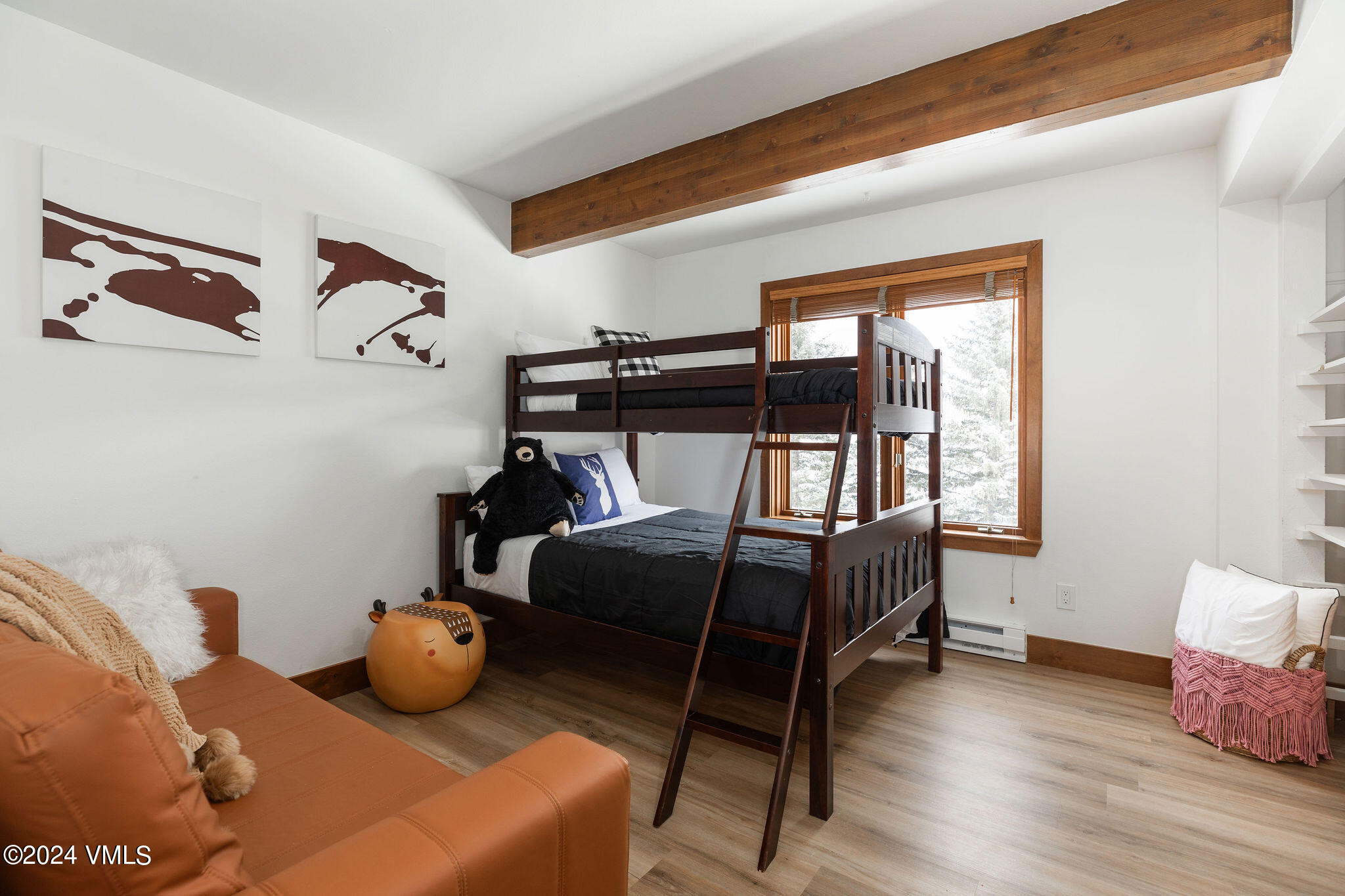 377 Holden Road Beaver Creek, CO 81620 - Photo 28 of 33 a bedroom with furniture and a window