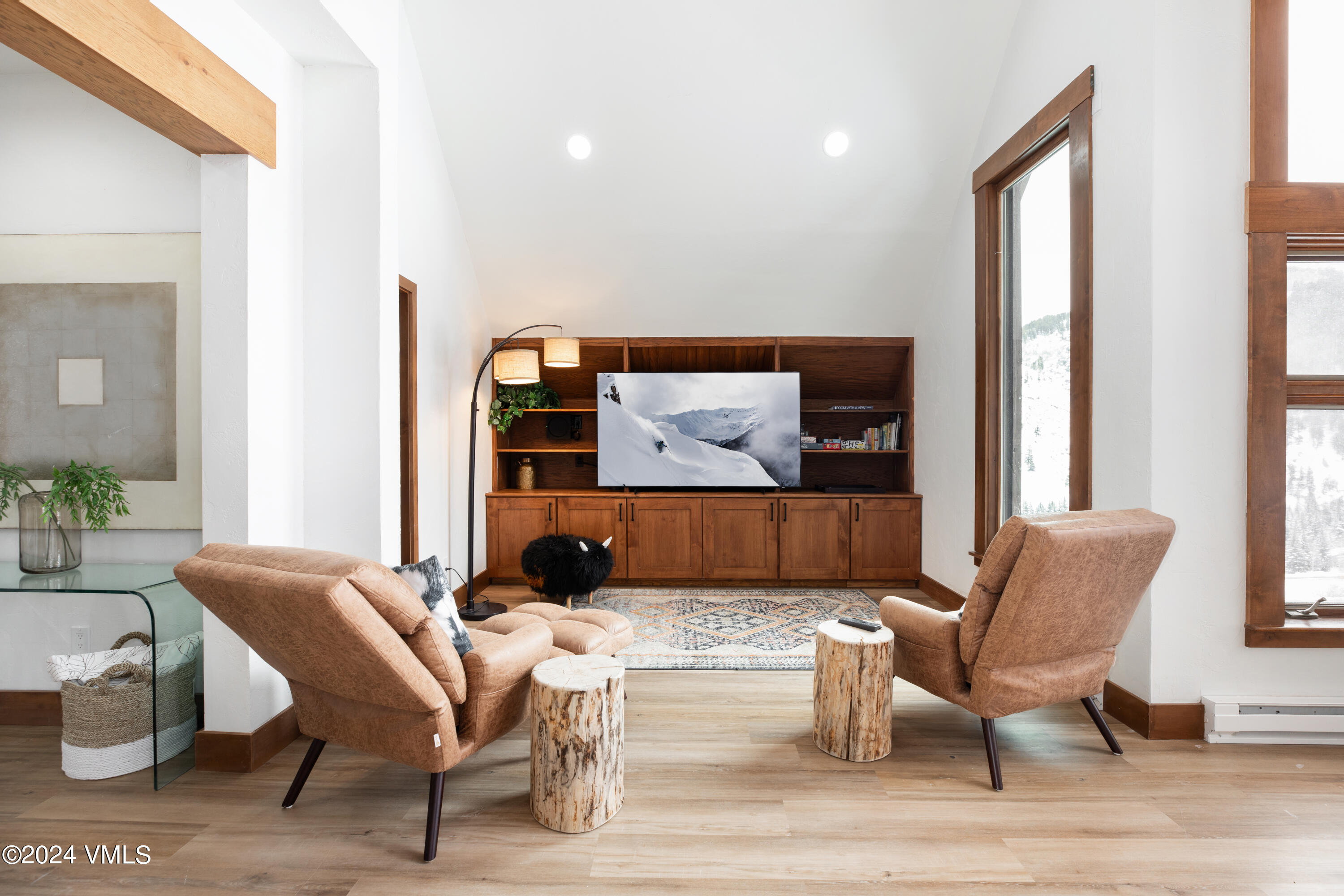 377 Holden Road Beaver Creek, CO 81620 - Photo 8 of 33 a living room with furniture and a flat screen tv