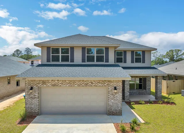 a front view of a house with swimming pool