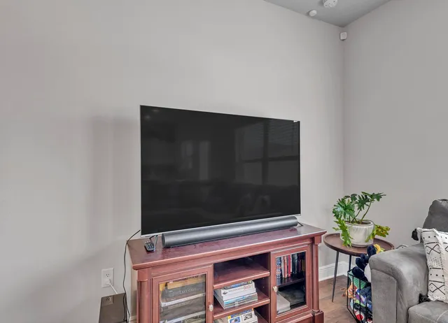 a room with a bed and a window