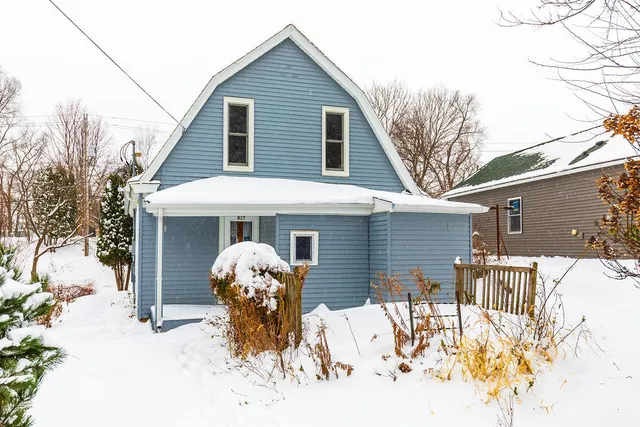a front view of a house with patio
