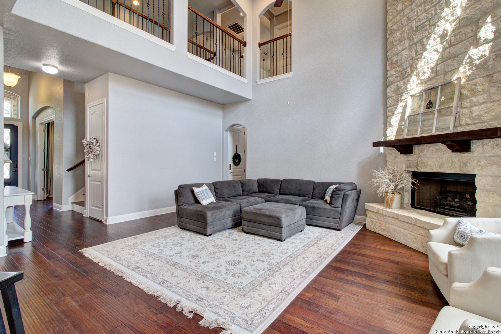 28518 Tristant Ridge San Antonio, TX 78260 - Photo 11 of 43 a living room with furniture and a fireplace