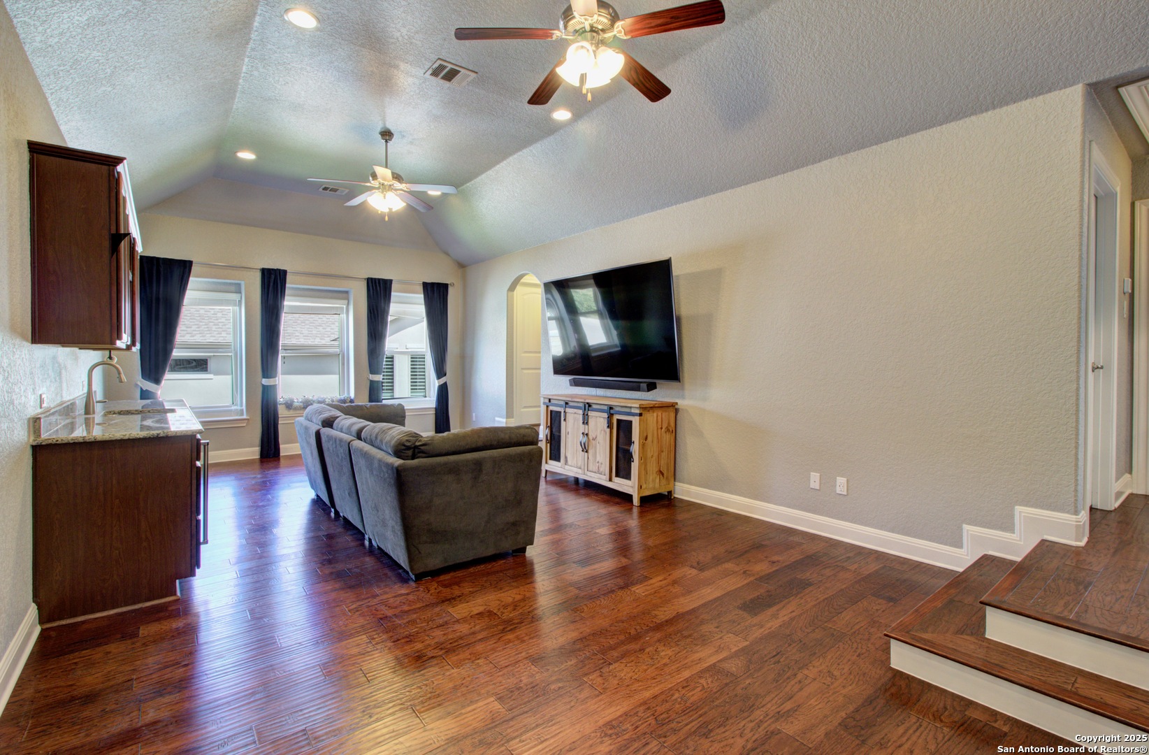 28518 Tristant Ridge San Antonio, TX 78260 - Photo 25 of 43 a living room with furniture and a flat screen tv