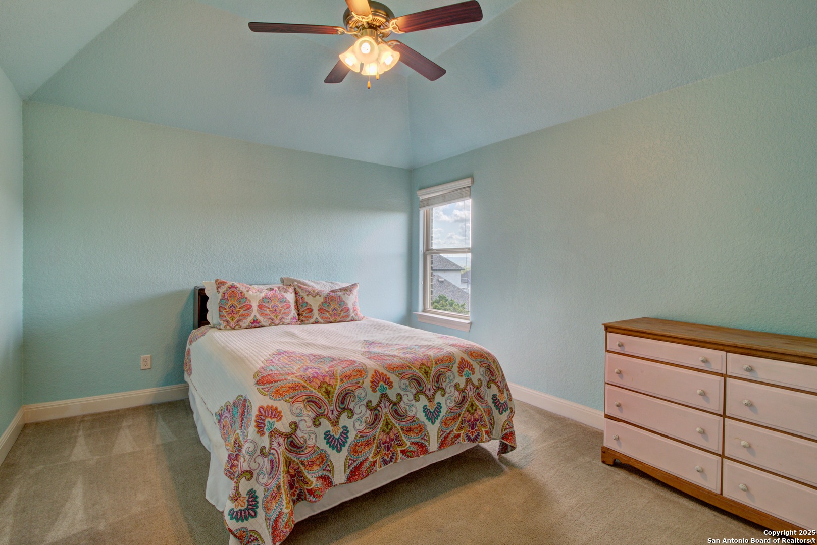 28518 Tristant Ridge San Antonio, TX 78260 - Photo 34 of 43 a bedroom with a bed and window