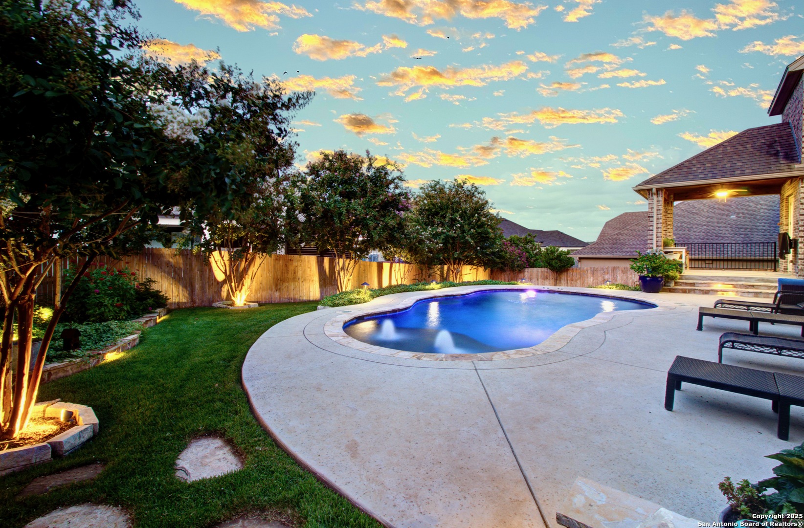 28518 Tristant Ridge San Antonio, TX 78260 - Photo 42 of 43 a view of a swimming pool with a patio and a yard