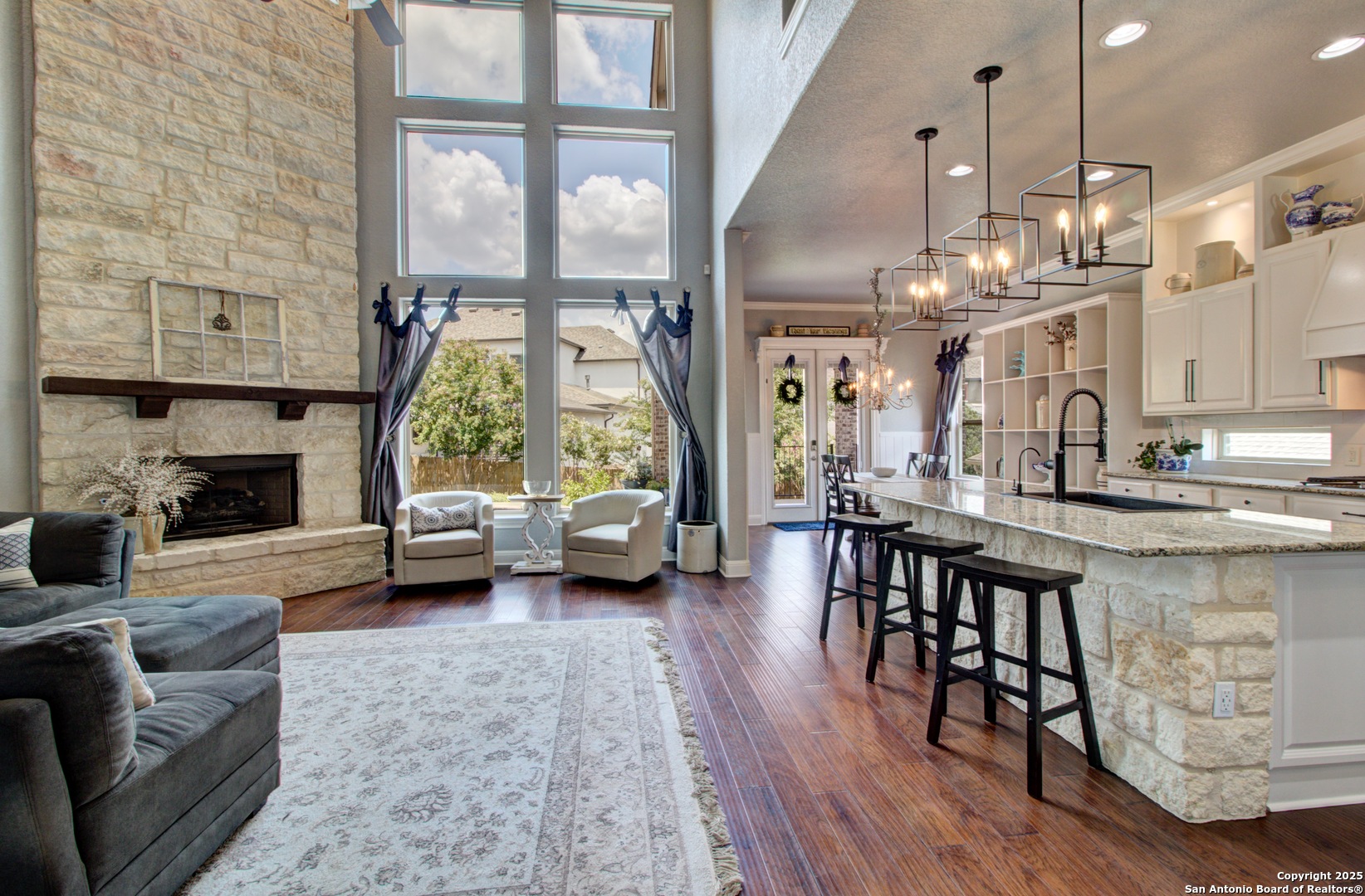 28518 Tristant Ridge San Antonio, TX 78260 - Photo 9 of 43 a living room with furniture and a fireplace