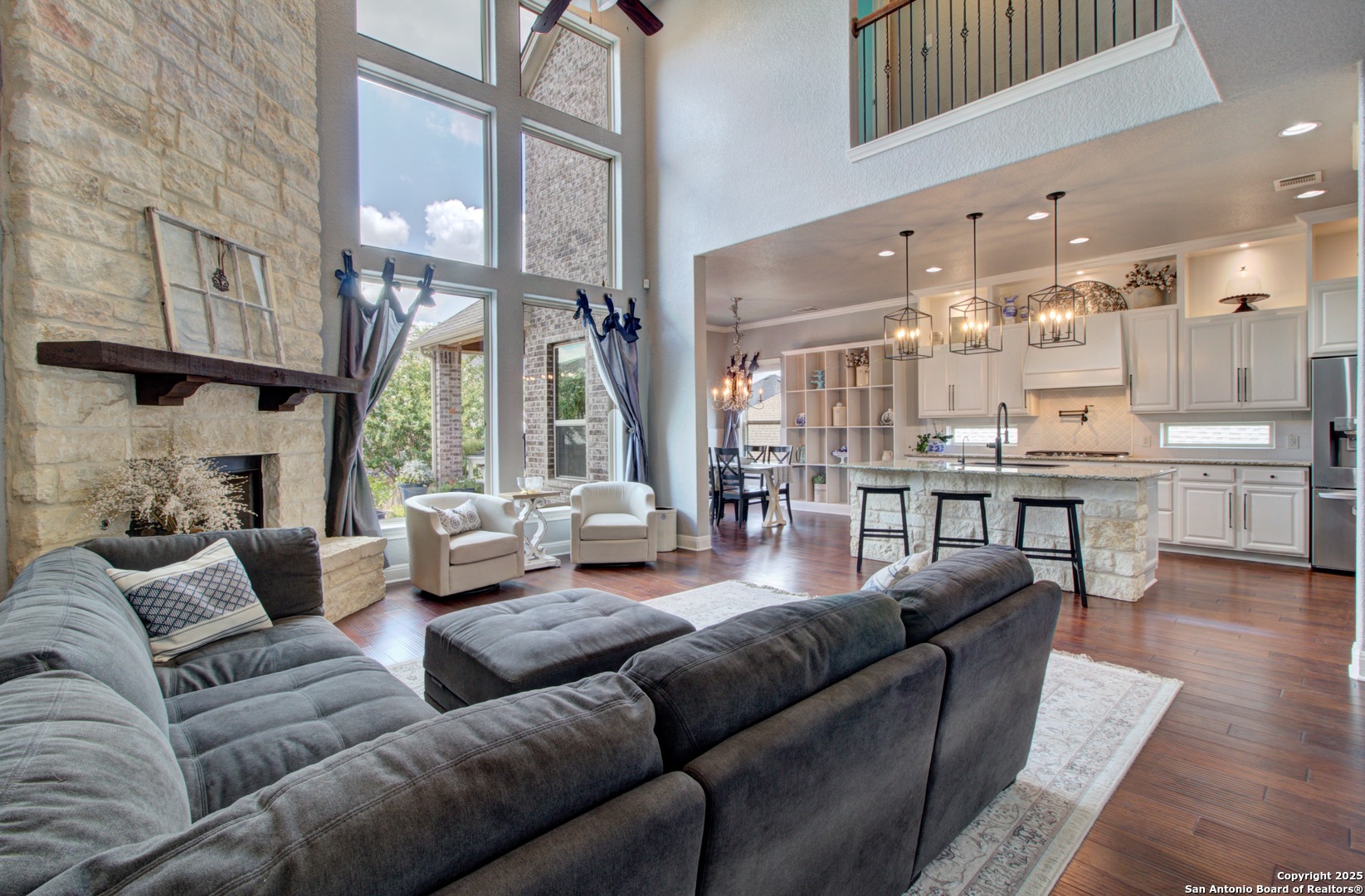 28518 Tristant Ridge San Antonio, TX 78260 - Photo 10 of 43 a living room with fireplace furniture and a large window