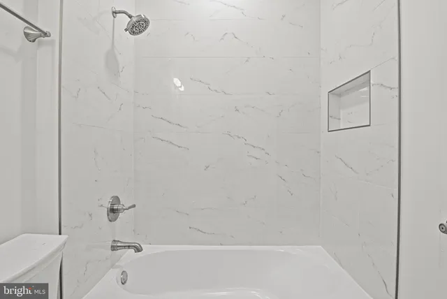 an empty room with an entryway