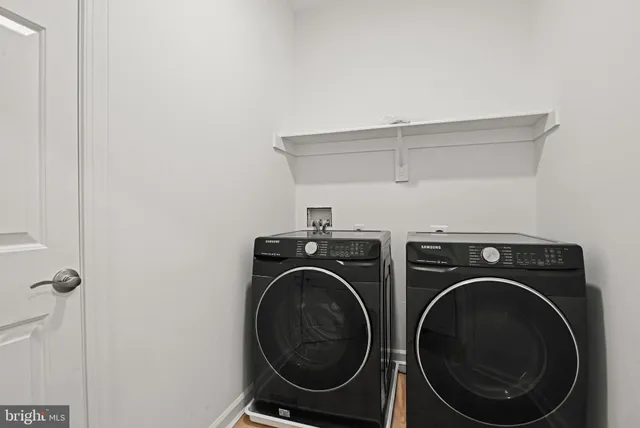 a picture of a bench in front of a wall