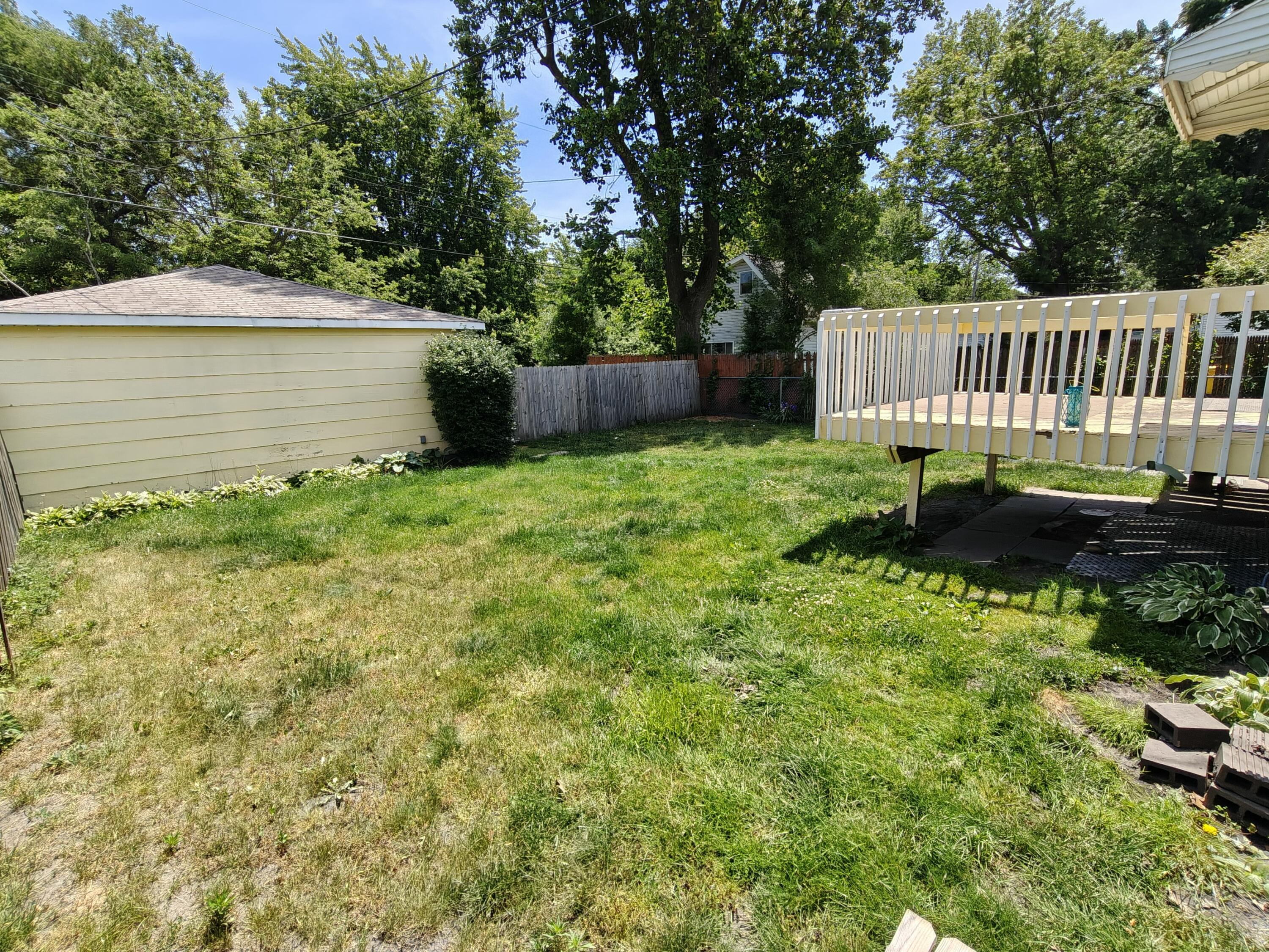 245 North Indiana Street Griffith, IN 46319 - Photo 28 of 30 a view of backyard with deck and garden