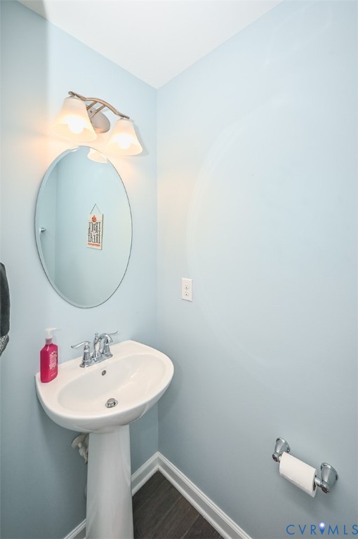 8990 Ringview Drive Mechanicsville, VA 23116 - Photo 16 of 39 First floor powder with baseboards and engineered