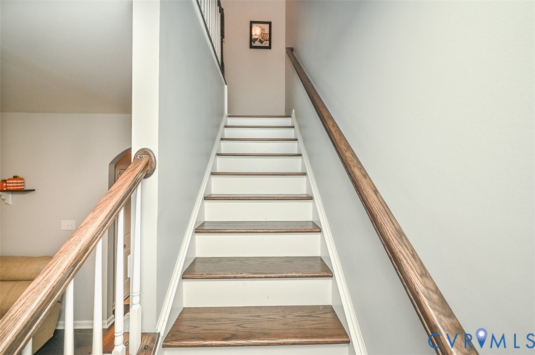 8990 Ringview Drive Mechanicsville, VA 23116 - Photo 17 of 39 View of staircase with engineered hardwood floors