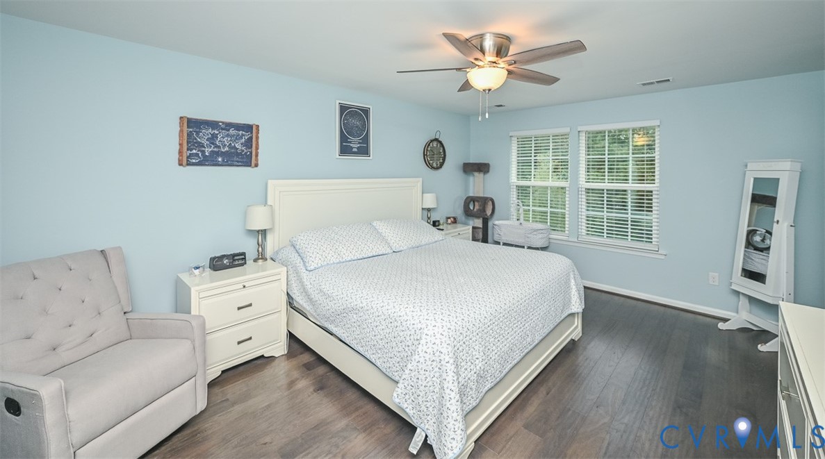 8990 Ringview Drive Mechanicsville, VA 23116 - Photo 18 of 39 Primary bedroom with engineered hardwood floors, c