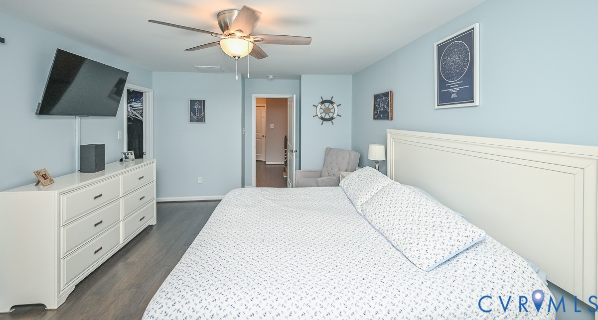 8990 Ringview Drive Mechanicsville, VA 23116 - Photo 19 of 39 Primary bedroom with engineered hardwood floors, c