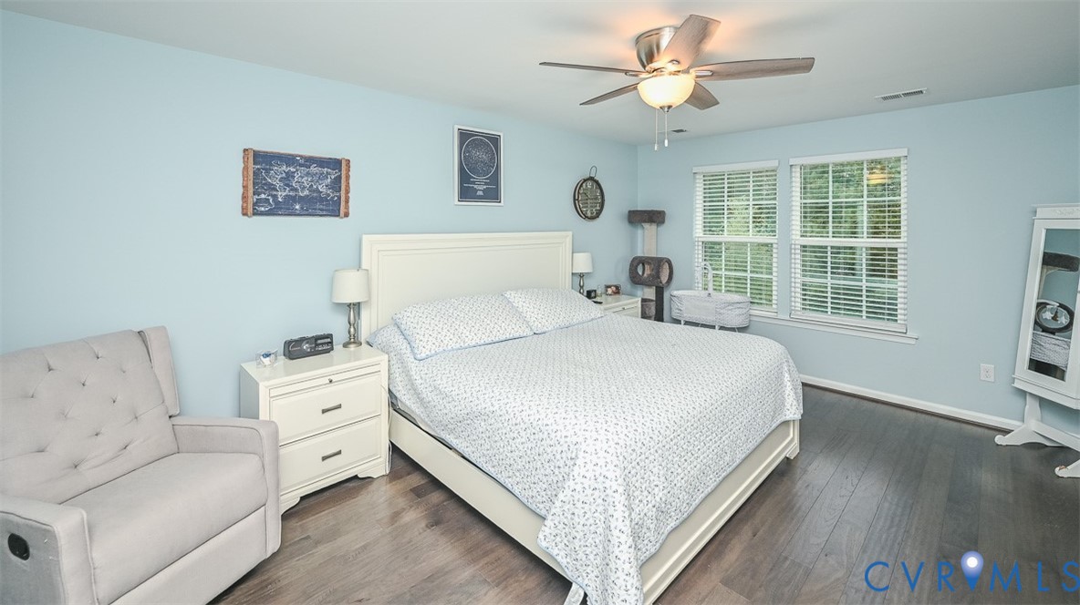 8990 Ringview Drive Mechanicsville, VA 23116 - Photo 21 of 39 Primary bedroom with engineered hardwood floors, c