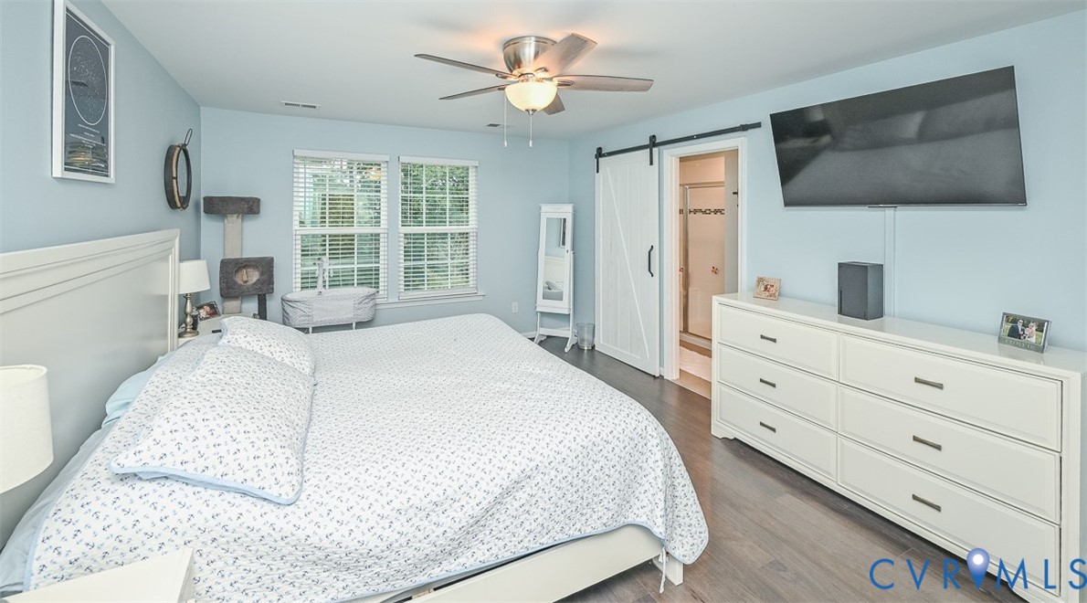 8990 Ringview Drive Mechanicsville, VA 23116 - Photo 22 of 39 Primary bedroom with engineered hardwood floors, c