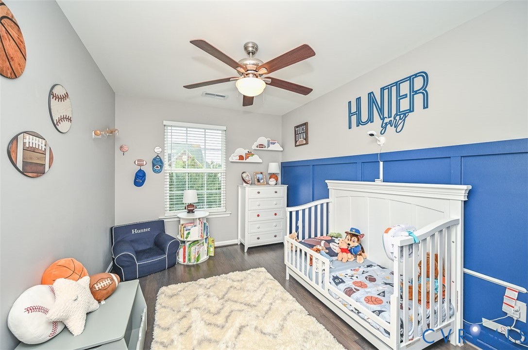 8990 Ringview Drive Mechanicsville, VA 23116 - Photo 27 of 39 Bedroom 2 featuring engineered wood flooring and c