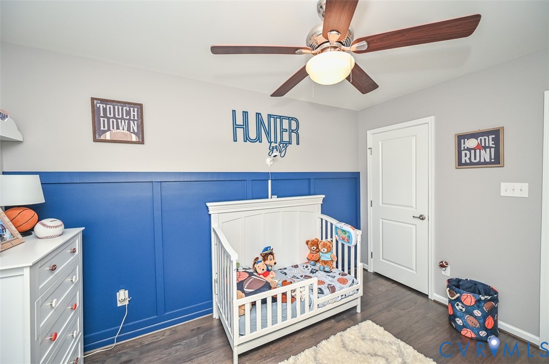 8990 Ringview Drive Mechanicsville, VA 23116 - Photo 30 of 39 Bedroom 2 featuring engineered wood flooring and c