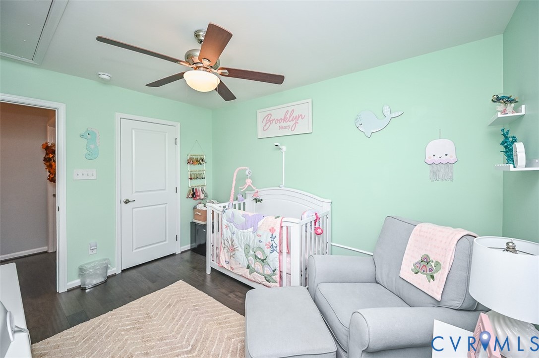 8990 Ringview Drive Mechanicsville, VA 23116 - Photo 34 of 39 Bedroom 3 featuring engineered wood flooring and c