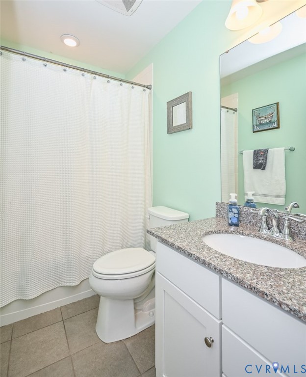 8990 Ringview Drive Mechanicsville, VA 23116 - Photo 37 of 39 Full bath featuring light tile flooring, vanity, a