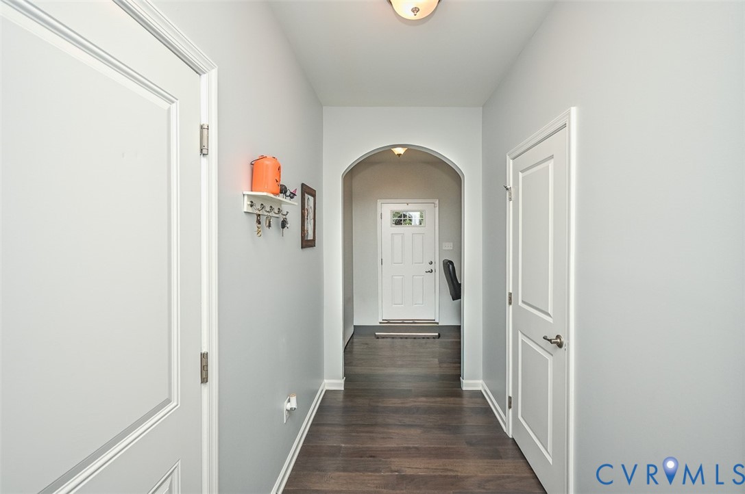 8990 Ringview Drive Mechanicsville, VA 23116 - Photo 7 of 39 Entry featuring arched walkways and dark engineere