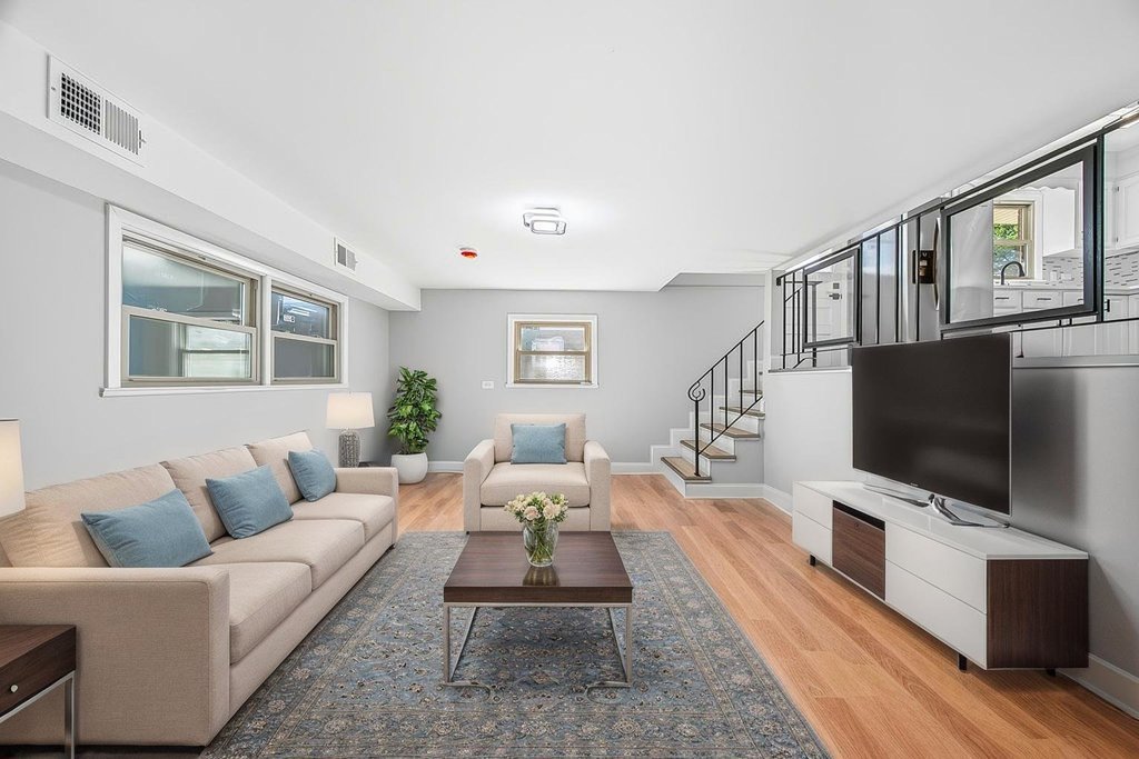 12549 South Tripp Avenue Alsip, IL 60803 - Photo 17 of 30 a living room with furniture and a flat screen tv
