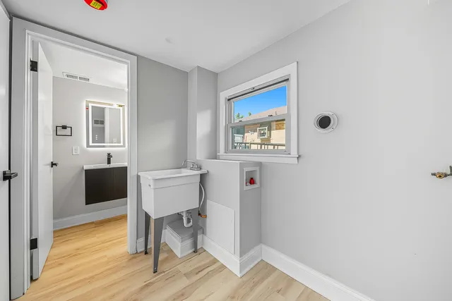 a room that has a chair and a wooden floor