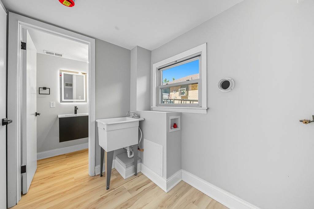 12549 South Tripp Avenue Alsip, IL 60803 - Photo 19 of 30 a room that has a chair and a wooden floor