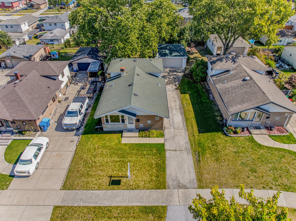 12549 South Tripp Avenue Alsip, IL 60803 - Photo 28 of 30 an aerial view of a house with swimming pool and outdoor space