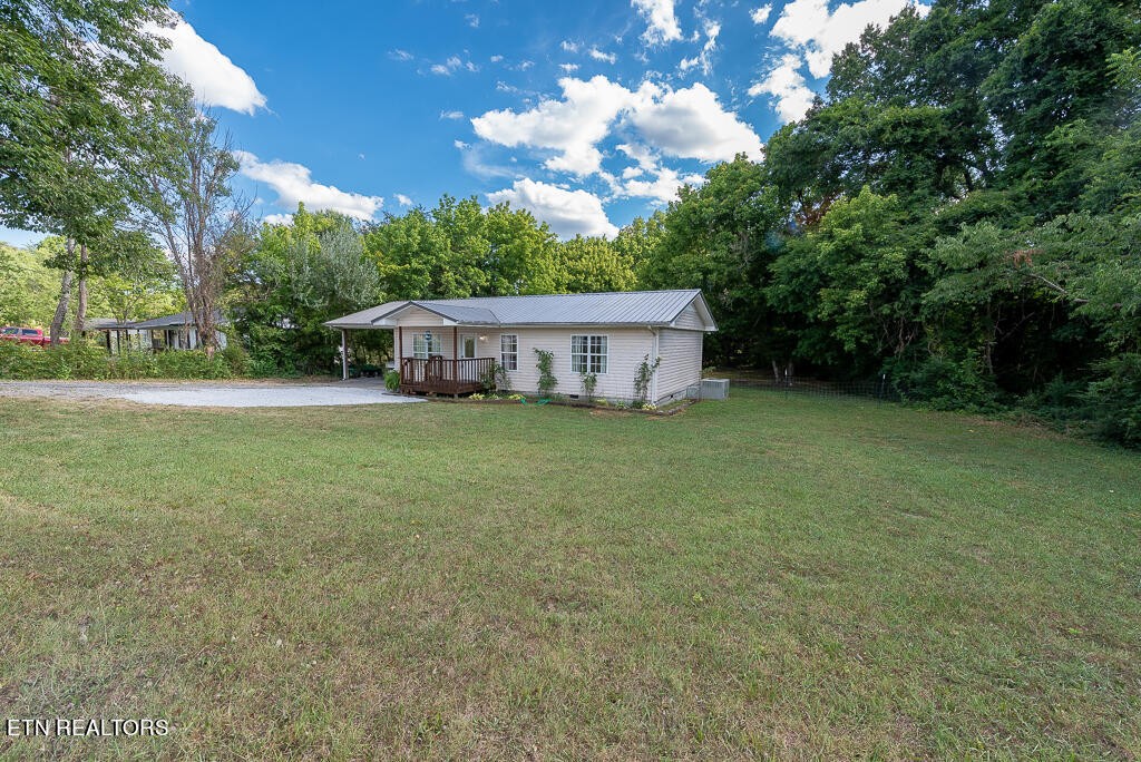 1330 White Oak Road Dayton, TN 37321 - Photo 4 of 20 a view of a house with yard and sitting area