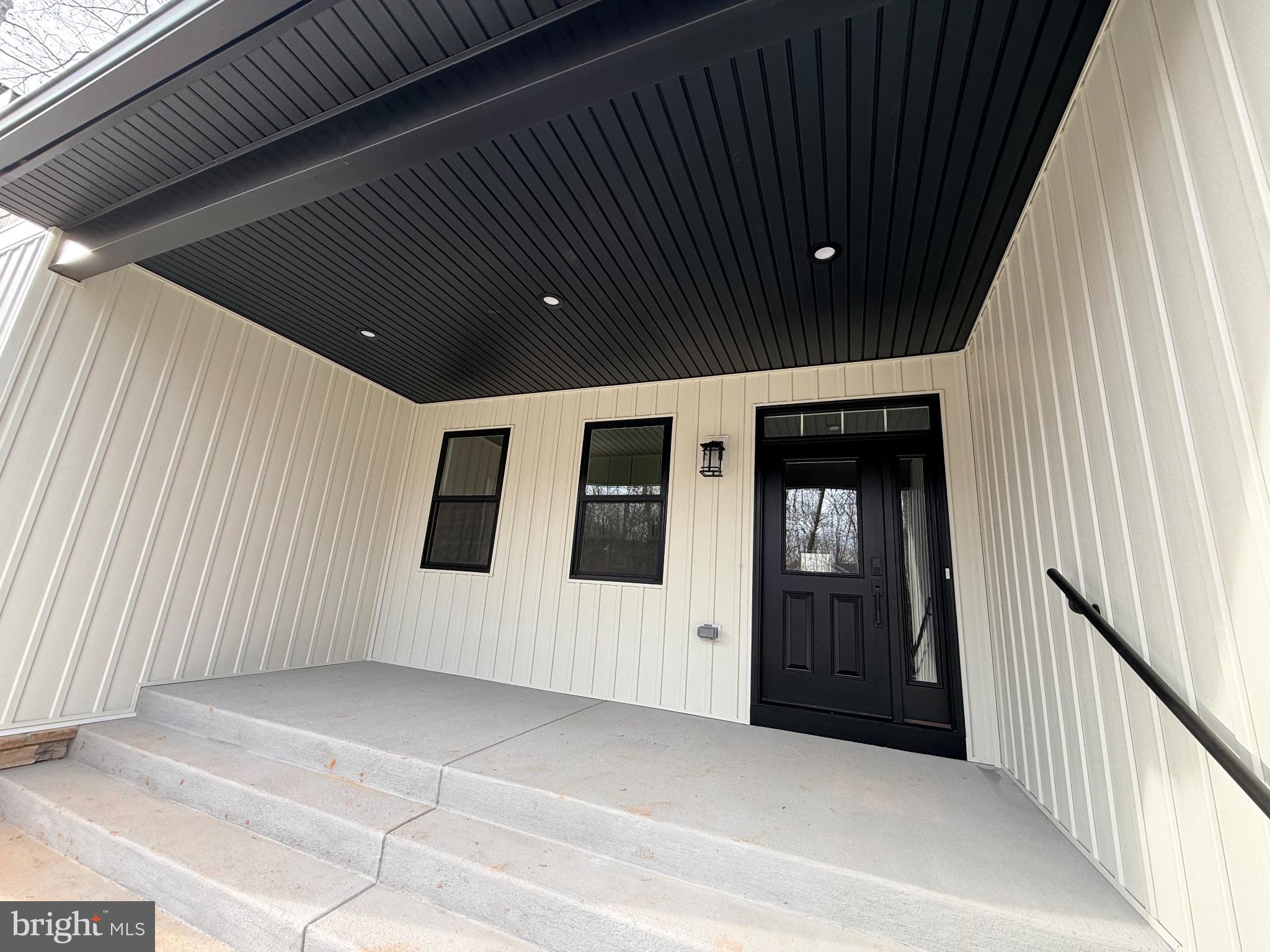 501 Gold Valley Road Locust Grove, VA 22508 - Photo 80 of 85 Modern entryway with sleek design elements.