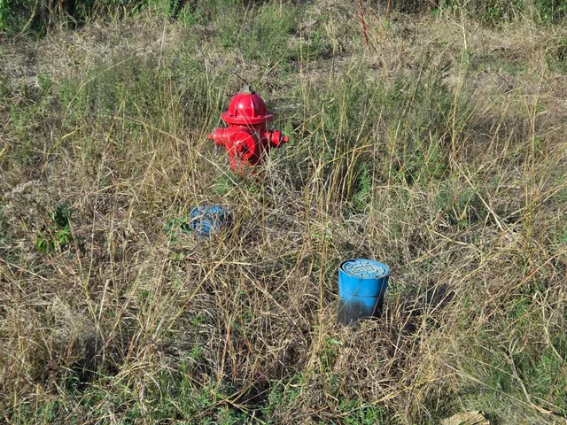 a view of a wooden floor with a sink and a stove