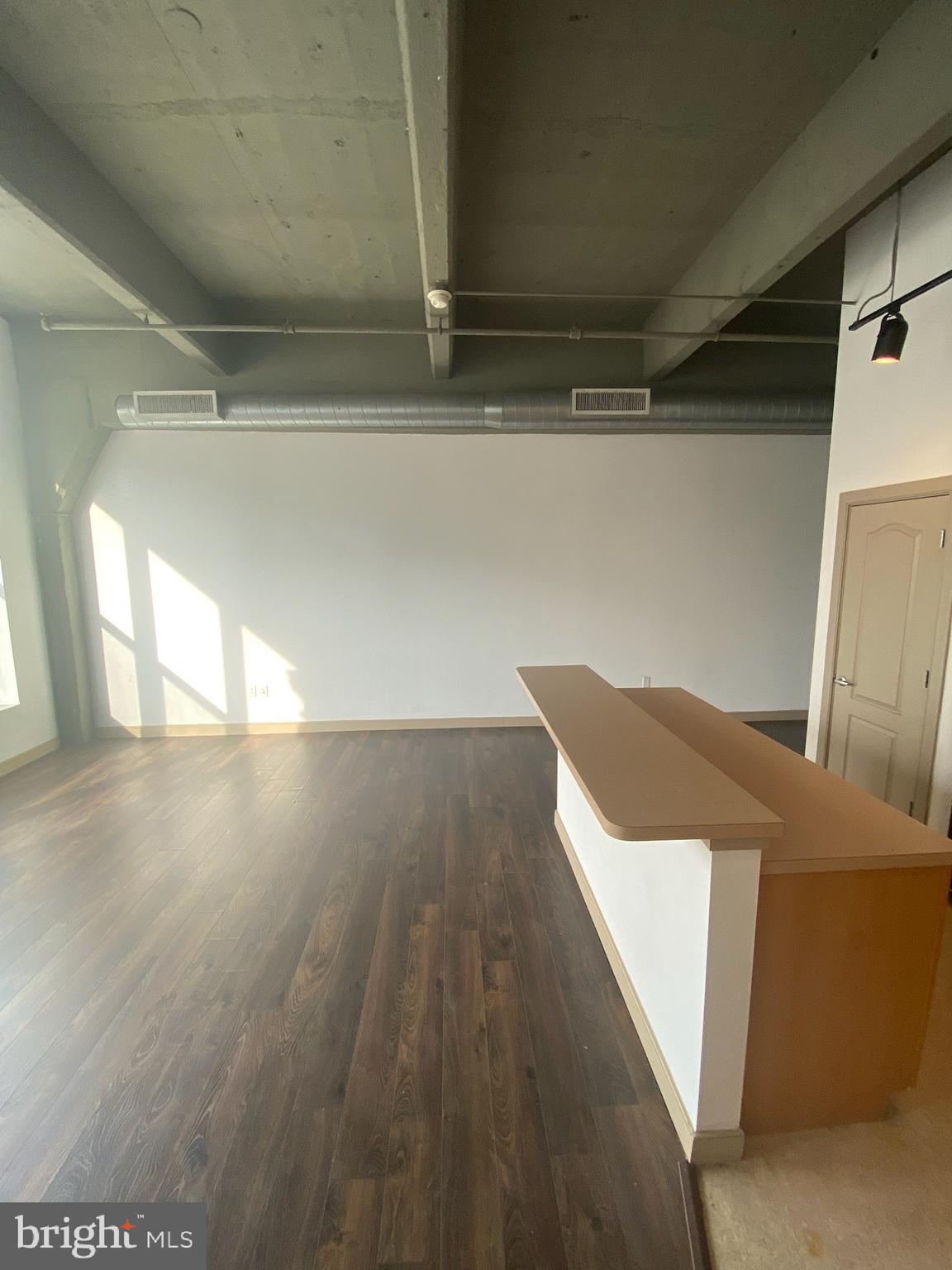 511 North Broad Street, Unit 202 Philadelphia, PA 19123 - Photo 17 of 29 a view of wooden floor in an empty room